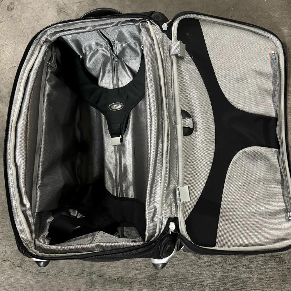 TUMI Carry On Rolling Suitcase